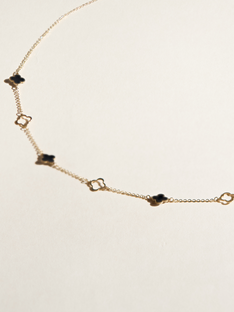Collier Charlotte mini trèfles noirs et dorés
