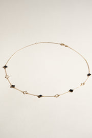 Collier Charlotte mini trèfles noirs et dorés