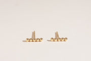 Boucles d'oreilles Jessica à pois dorés 