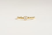 Bague Taylor avec fleur à pois en or 